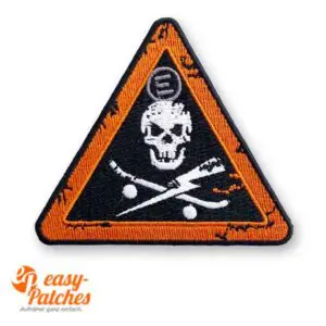 Aufnäher in Form eines Dreiecks.